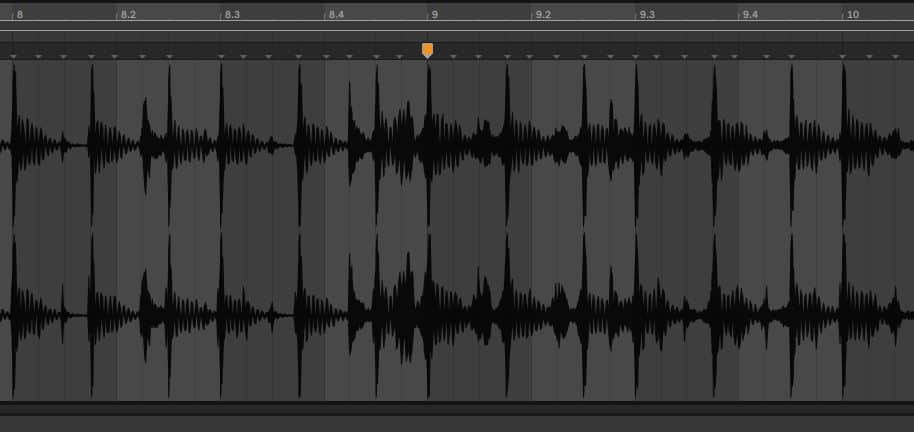 A wave form in Ableton visually representing an audio track. At the top, time markers indicate a span from 8.0 to 10.0 bars, with a yellow warp marker added at 9.0.