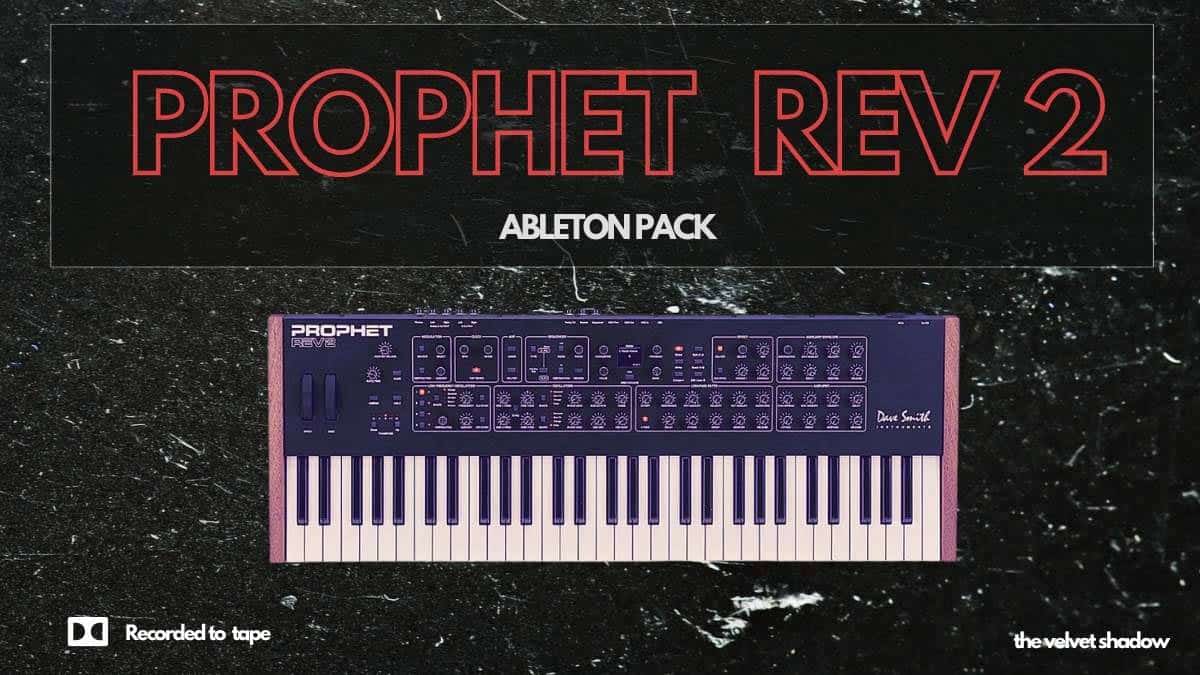 A Prophet Rev 2 synthesizer keyboard is depicted with the text "PROPHET REV 2" prominently displayed in large red letters at the top. Below this, "Ableton Pack" is written, flanked by logos for "Recorded to tape" and "thevelvetshadow" at the bottom corners. The entire composition rests against a black textured backdrop.